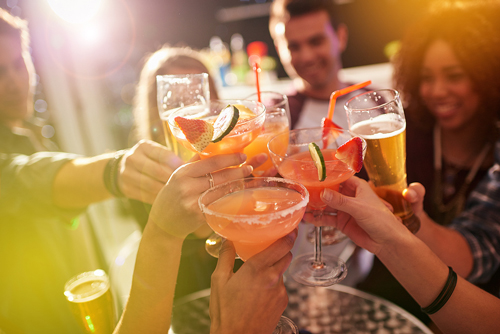 Group of people enjoying drinks together